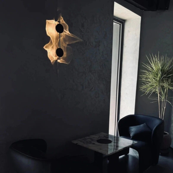 Applique murale rotative 360° blanc mat, double faisceau — vue de trois quarts