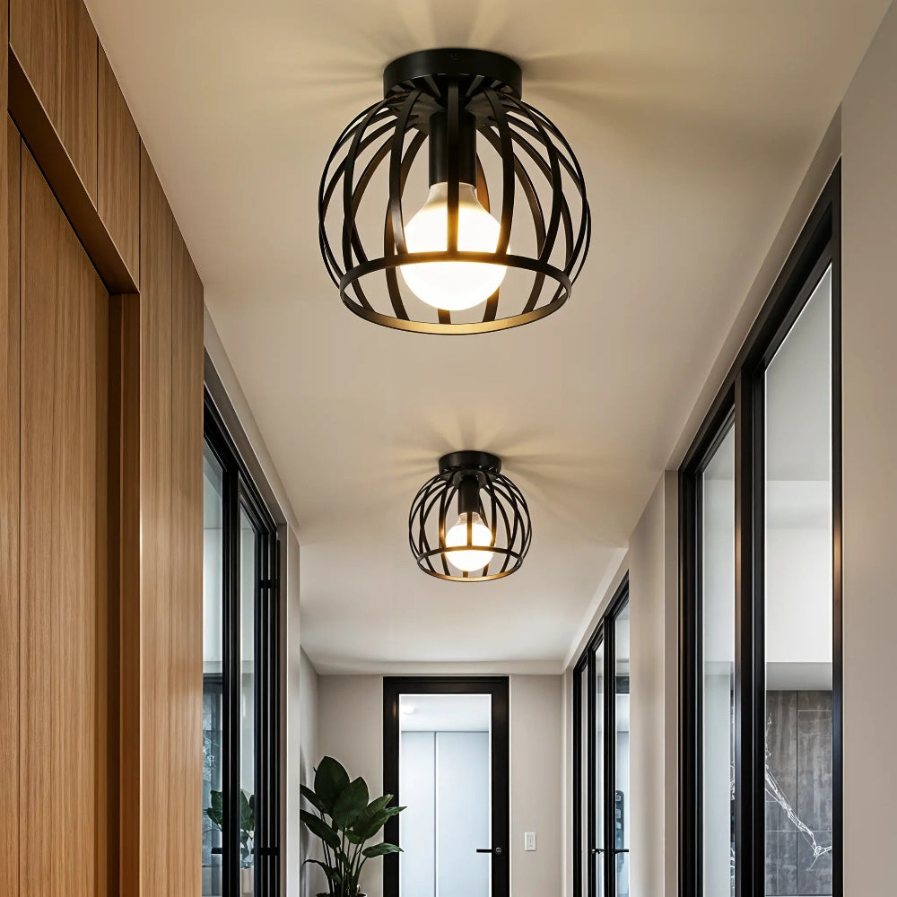 Plafonnier noir mat ajouré E27, diamètre 19 cm – couloir — vue de face
