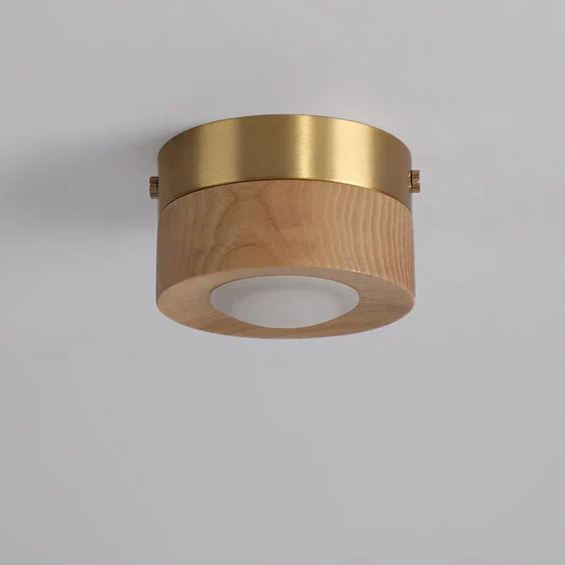 Plafonnier LED en bois de noyer – format compact 100 mm — vue de trois quarts
