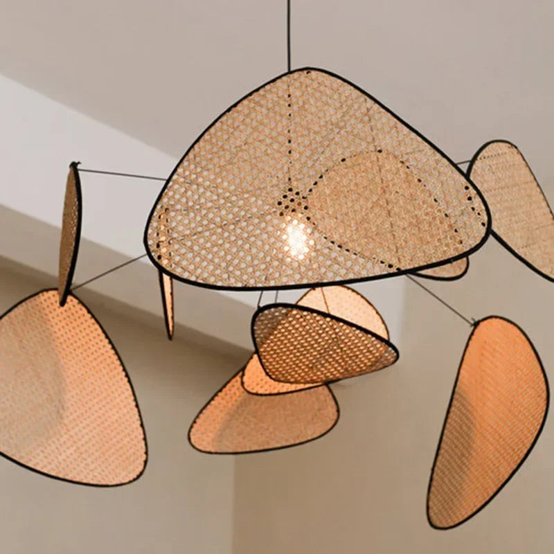 Suspension en rotin sculptée 60 à 120 cm dimmable – Aerelia — mise en situation dans la pièce (2)