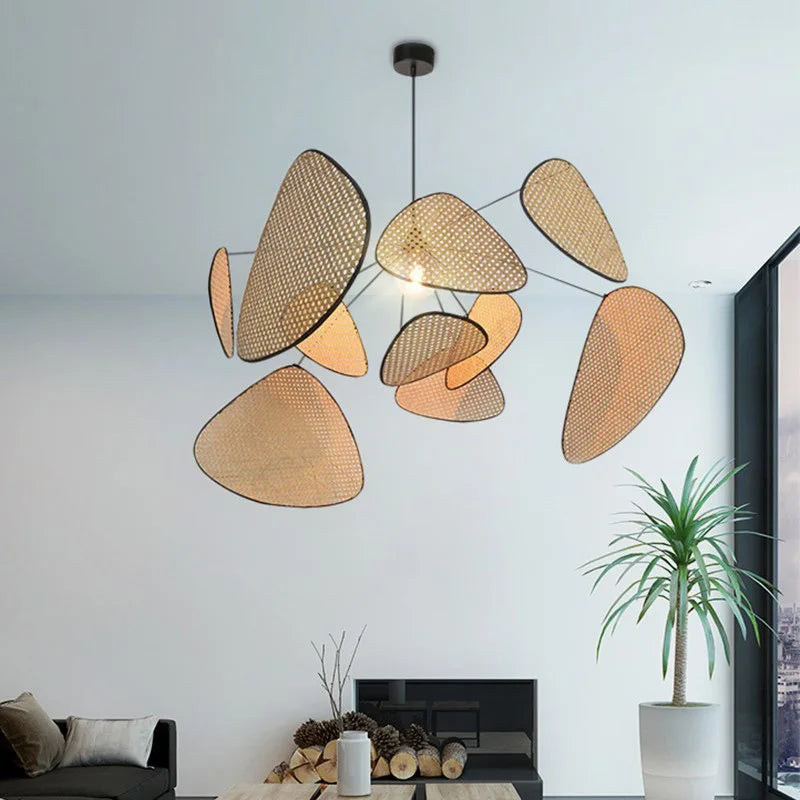 Suspension en rotin sculptée 60 à 120 cm dimmable – Aerelia — allumé en situation (2)